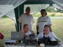 Steve Fritts, W4SEF, his wife Sharron Fritts, W4WIF, visitor and future ham radio operator Joe Penland, and David Lowe, KC4VBK discuss amateur radio operations and how to become licensed operator.