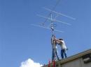 KD5MML and AD5JT mount the yagis for the VHF station <i>photo by KE5QZQ</i>