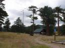 The SteppIR antenna at 40' next to the shelter that housed the WØDK station this year.