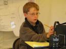 Barc Junior member Brady looks very intent while hunting and pouncing his next Field Day QSO at ACØGW. 
