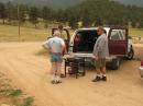 "Well, we might as well lift the generator up... it ain't going to jump into the back of this wagon by itself!"