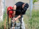 Larry filling gas tank on generator Saturday afternoon, it had a small tank.