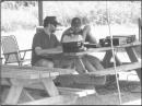 Dave (N4DBC) &amp; Brian (KI4URO) working 80m with a dipole -
<i>Picture courtesy of "The Gateway", a local newspaper which reported our Field Day 2008 event</i>