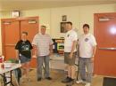 Chance Hayes, Wichita, KS National Weather Service (2nd from the left) visited our operation and thanked the SKYWARN coordinators - Sherry Weir, KB0SQQ - Jim Enix, KC0QIE - and Randy Wing, N0LD for their support through the year