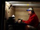 Randy, KF0X operating inside his 4x6' cargo trailer.