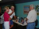 Paul Milward AB4PM (right) provides info at the booth to visitors about ham radio