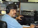 My attempt at looking awake on the last day as I get done making a phone contact. <i>Picture from KC0RAD</i>