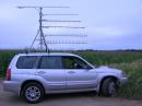 Antennas top to bottom: 2304, 3456, 222, 432, 1296, 902.  With the exception of 2304, all booms are five to six foot end-mounts.  The three foot Radio Shack tripod is U-bolted to a Yakama roof rack.  The mast is aluminum such that if I hit something its the first thing that give !  5.7 and 10 GHz are tripod mounted dishes.