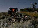The optical station, in the light of the full moon. (Only the Laser Pointer - above the orange telescope - was active when this picture was taken.)