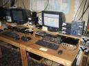 Here is a view of both operating positions.  Below the table is all the various power supplies for powering the amps and radios.  