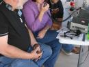 Mary getting her feet wet in Ham radio at the GOTA station
