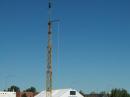 Club President Norm Palin, K7NCR, cranking up the portable tower.