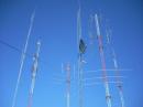 The 192' tower to the left is the J-poles for 40 and 80 meters.  The 15 and 20 Meter tribanders are in the ruckus somewhere!
