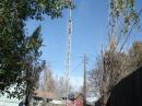 A Hy-Gain vertical and 80 meter dipole hanging in a tree.  There are no listening antennas on this city lot. 