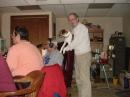 Dennis K0DNG holding our new club mascot, and crazed canine friend named "Bo".