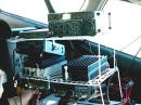 The KK6MC/r operating position in the back seat of a Subaru Outback station wagon. Gear was an IC551D (later replaced by an FT-680) on 6M, on two an FT290II driving a TE Systems 125 Watt linear,  on 222 MHz an Elecraft XV222 transverter driven by an HTX-100 IF,  and on 432 MHz an FT780 to a KLM amplifier running at 50 Watts.