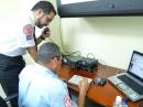 The operating position at KP4PRS with WP3ZZ at the mike and WP3DX doing the logging.