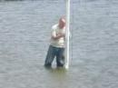 W7UDH, Dick, Adjusting the 40-meter curtain (something to do with tides and launch angle).