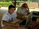 Jacob Moore, left, works as a logger for Jack Beith (K5WNU) who was working CW at the Pearl River County Amateur Radio Club Field Day 2009 event. Jacob is considering getting his ticket and joining local hams on the air. His father, David Moore (N5ELI) is a member of the PRCARC. Photo by Larry Wagoner (N5WLW).