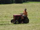Ed, W8EDB, mowing the field.  This is where it starts.