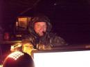 AD5VM action photo, trying to stay warm and dry.