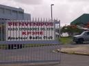 ENTRANCE TO THE SCHOOL, AND OUR GROUP BANNER