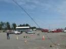 Raising the SSB antenna support towers. The antenna is a two-element multi-band wire yagi.
