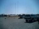 The SSB Station looking southeast over the tent-trailer shack and through the wire antenna.