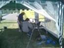 Bob, KF7APN, and Taileen, KF7CWO working contacts on the GOTA Station. Mike, KE7DOV, has his Satellite rig tucked just inside.