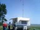 The CW shack is a trailer with a Spider Beam for 20-meters erected behind it.