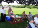 Members taking some time out to relax and have some food.