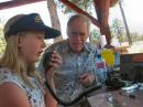 Granddaughter, Timon attempting to make her first Field Day GOTA contact while proud Grandpa, Don Hume, KRØE looks on intently. 