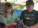Joan Hauser, KCØYUZ showing BARC VP Gary Carroll, WØQN some of the finer points of her digital camera before heading for a nature photo shoot down the beautiful hiking trails around our Field Day site.