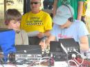 Joe, one of our GOTA kids, awaits instructions from coach Nina N1COB as dad Craig W1ZN looks on.