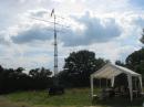 Daytime picture of the N3SH mobile tower trailer (designed and built by Randy George N3ZK) next to the N3SH SSB operating tent.  Photo courtesy of Ron Telek W3LE &amp; used with his permission