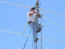 AG4BV Connecting the Mosley Tri-Band beam on the top of Rohn Tower