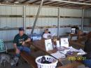 Ham literature table being guarded by Charlie Messenheimer (K7CWM) assistant county emergency operaztions manager and David King (WY7DK) county emergency operations managber
