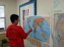 Brandon locating his QSO on the map.  Photo compliments of Elizabeth Garay.