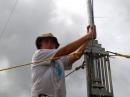KH7CC - Tom at the top of the tower.