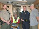 Our served agencies. From left: Mike Wheeler, Emergency Communications Director; Willie Mortimer, W6OED, Red Cross; Officer "TJ" Newport police, and Mark Miranda, Chief of Police, Newport