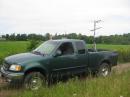 The rover rig in EN45vk, the highest point in Wisconsin, near Ogema, WI.  Obviously, I am having a good time!