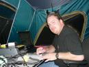 GOTA coach Bill Johnson, KC9MTP, checking GOTA logs for accuracy.