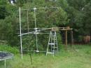 The newly constructed 2x4 tiltover tower with the mast and antennas mounted, ready to rotate up...