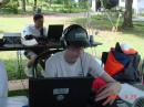 Christopher / KG4UOY after an all niter and 100 contacts at the GOTA station. Wes / KS4XQ in the background.
