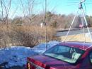 This is our standard setup.  A three-element Yagi on a tripod for Two Meters on our car roof (also used on 432 MHz) and a three-element Yagi on Six Meters, mounted in an umbrella stand.