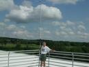 Jim, NX9R, poses with the MA5V vertical and its excellent perch above the Nine Springs E-way south of Madison. 360 degree unobstructed view!