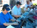 Left to right John N7UPM, John N7AAM, Jerry K7VIT, and Chris N7UBS (GOTA) seek out some hard won QSO's under cold band conditions on a hot early Saturday FD afternoon.  The temperature reached 95° F./35° C.   Photo courtesy of John KX7YT/S21YV.
