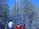 Here we are trying to reach the UHF barrel connector at 15 off the ground to change out a bad feedline. Sure wish we had tested the cable before raising the beam!