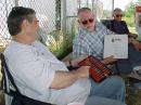 Joe WD8EOG, Chuck K8UQY, and Bob KU8C check out the new FD Scoring Tool! [WA8YCD Photo]