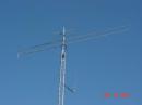 Top to bottom: 3 elt 6m, 10 elt 222, M2 432-13WL, Cushcraft 4218XL. 2m J-Pole at lower right is my APRS IGATE station.